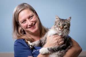Dr. Julie Johnston holding Prudence the cat